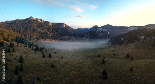 Early morning mist at Veliki Lubenovac, Northern Velebit, Croatia photo