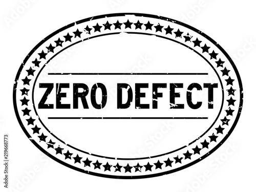 Grunge black zero defect word oval rubber seal stamp on white background