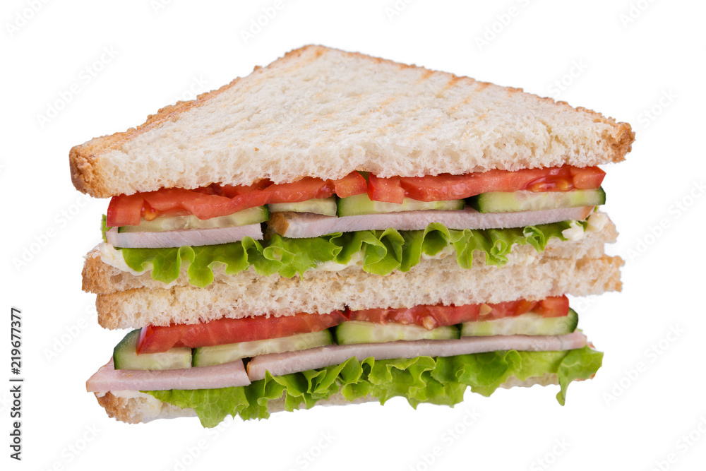 sandwich on toasted bread with ham and cucumber, tomato and lettuce, on white background, isolate sandwich on toasted bread with ham and cucumber, tomato and lettuce, on white background, isolate