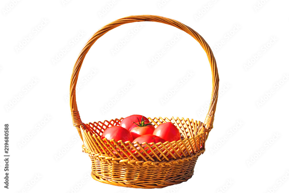 Fresh red tomatoes in wicker basket isolated on white background Fresh red tomatoes in wicker basket isolated on white background