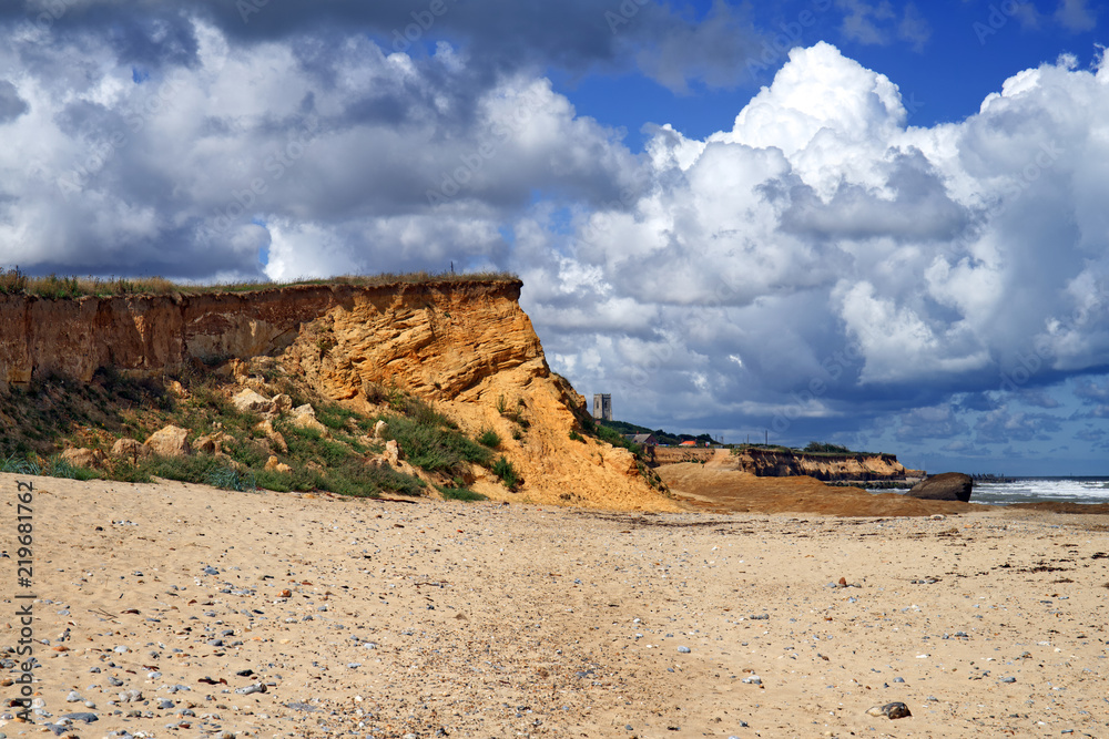 Coastal erosion of sandy Cliffs at Happisburgh in Norfolk, UK