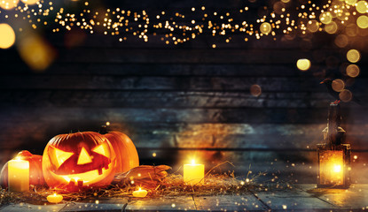 Spooky halloween pumpkins on wooden planks
