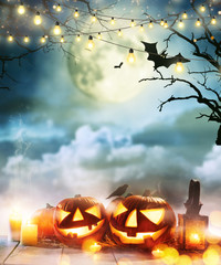 Spooky halloween pumpkins on wooden planks