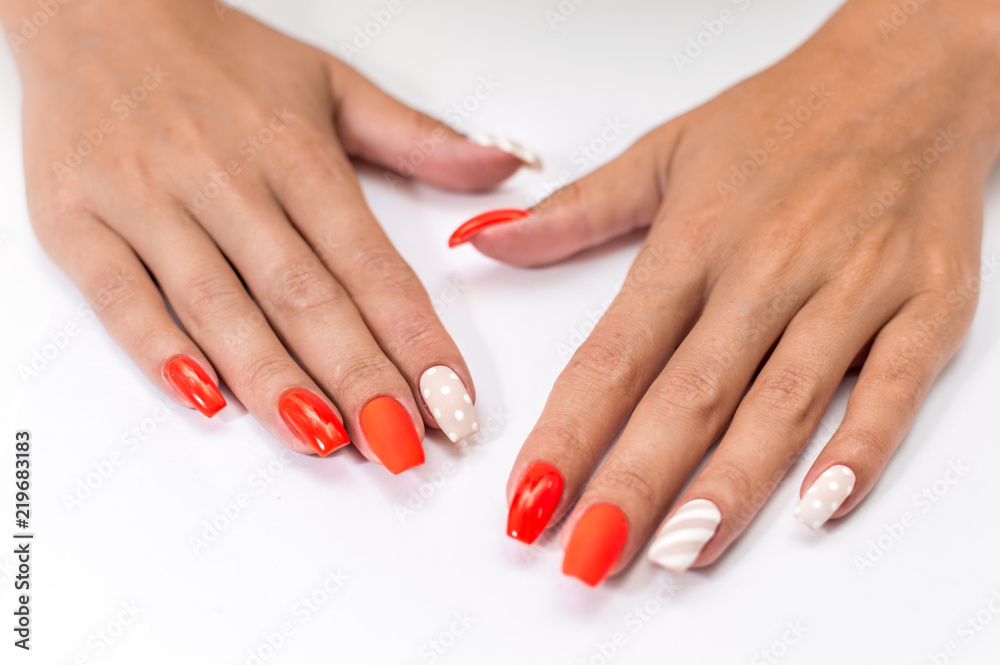 Female manicure on white background