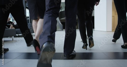 Business people walking in hall
