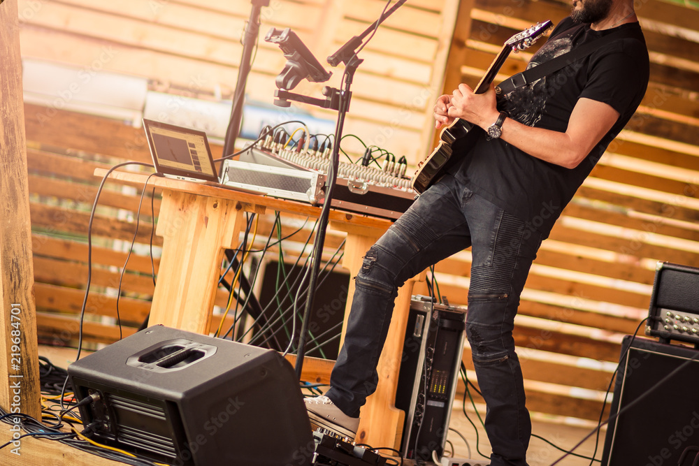 Obraz premium Guitar player performing on stage.