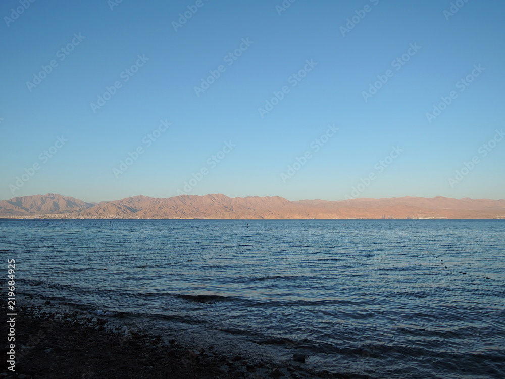 Eilat beach and view on Red Sea and Jordan mountains
