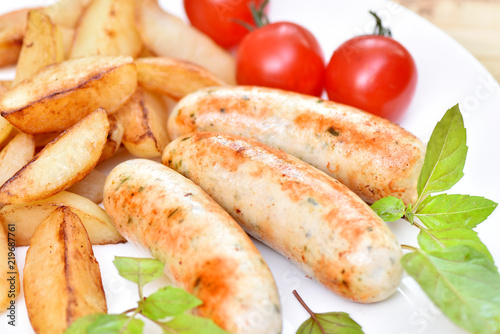 Bavarian sausages. German cuisine. A dish of chicken meat.