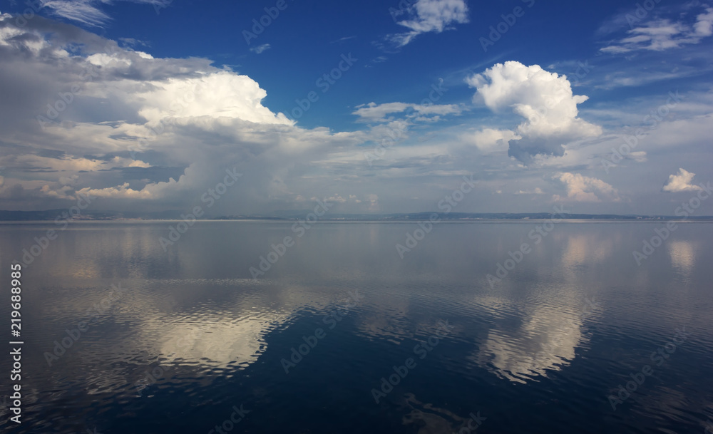 Seascape with Reflected Big White Clouds