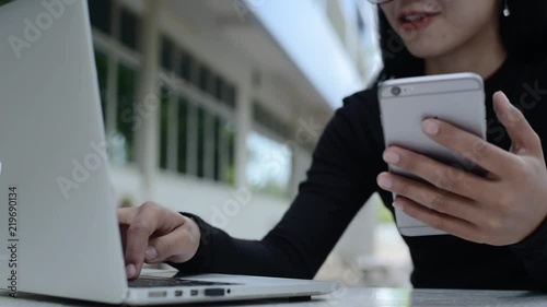 close up of hands woman using typing on smart phone cellphone device connecting wifi