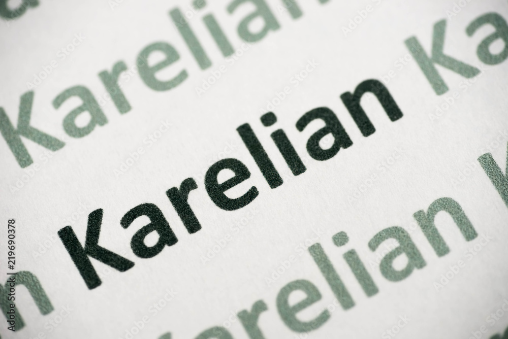 word Karelian language printed on paper macro word Karelian language printed on paper macro