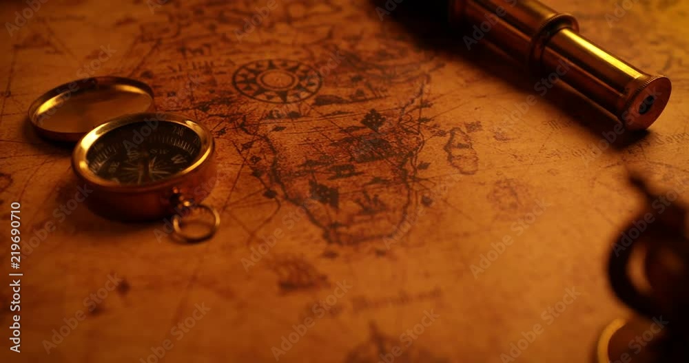 navigation items on old world map. 4k dolly shot
