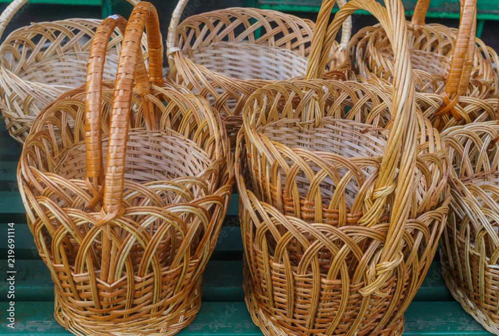 Collage of different wicker baskets made from willow twigs