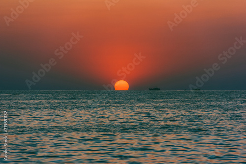 Fototapeta Naklejka Na Ścianę i Meble -  seascape with the setting sun and ships