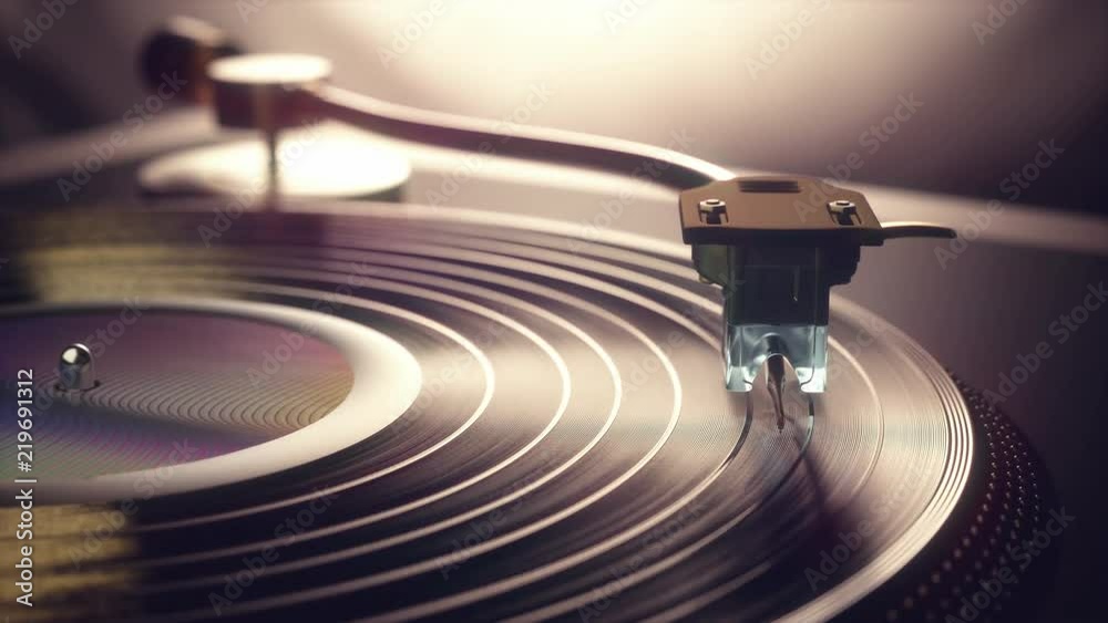 Vinyl record being played on old retro vintage disc jockey device.