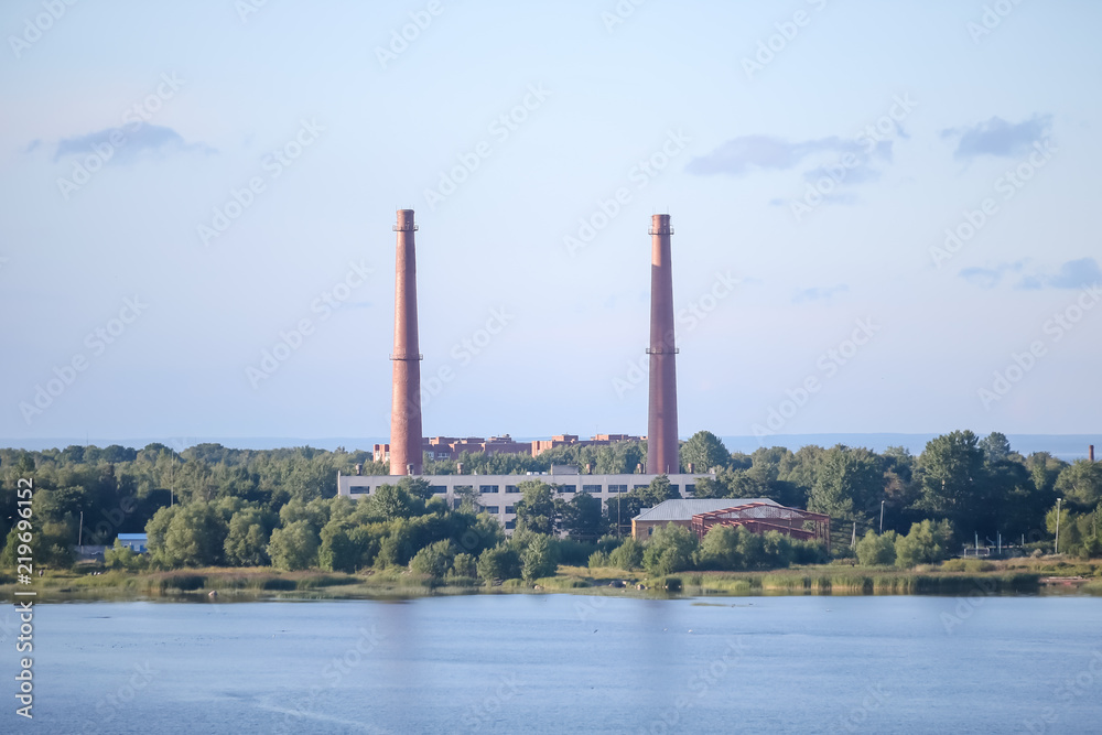 Industrial buildings and smokestacks in St Petersburg from the water