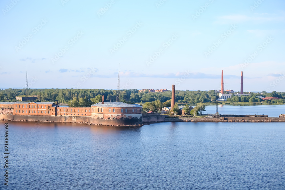 Industrial buildings and smokestacks in St Petersburg from the water
