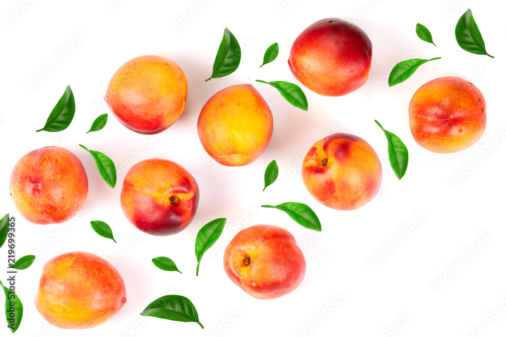 ripe nectarine with leaves isolated on white background with copy space for your text. Top view. Flat lay pattern ripe nectarine with leaves isolated on white background with copy space for your text. Top view. Flat lay pattern