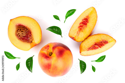 ripe nectarine with leaves isolated on white background. Top view. Flat lay pattern