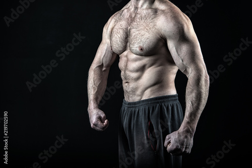 Great body result of regular training workout gym exercises. Torso muscular male body. Bodybuilder achievement great shape. Sexy naked torso. Chest six pack tense muscles looks impressing attractive