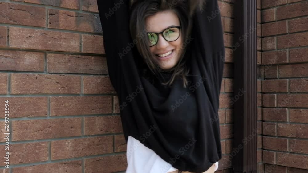 Close up of stylish young woman smiling. Beautiful female model. Pretty girl looking at camera and smiling. Close up of stylish young woman smiling. Beautiful female model. Pretty girl looking at camera and smiling.