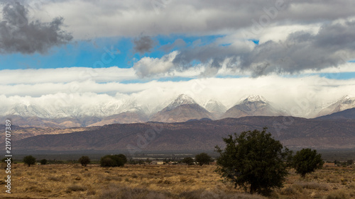 Atlas mountains covered in snow as seen from a highway in Morocco