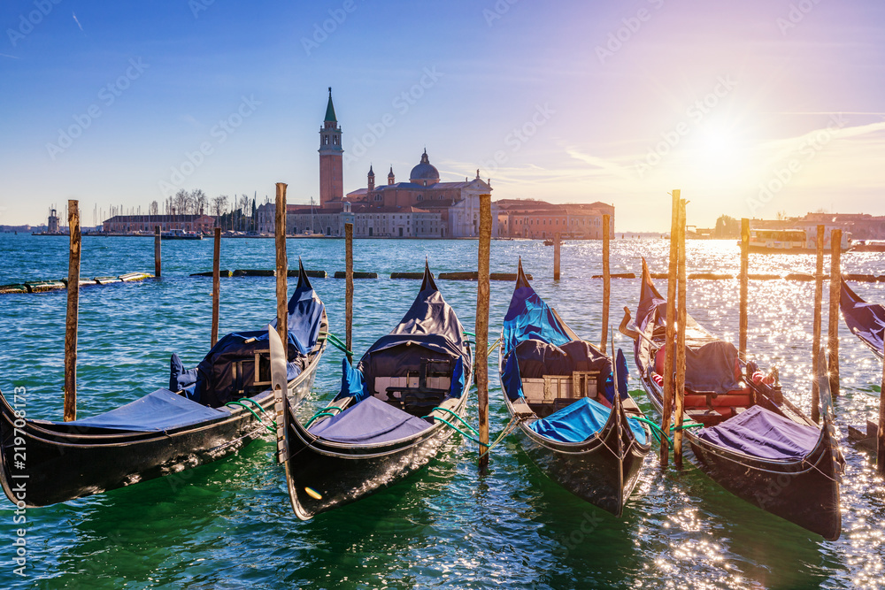 Sunny day in San Marco square, Venice, Italy. Venice Grand Canal. Architecture and landmarks of Venice. Venice postcard with Venice gondolas