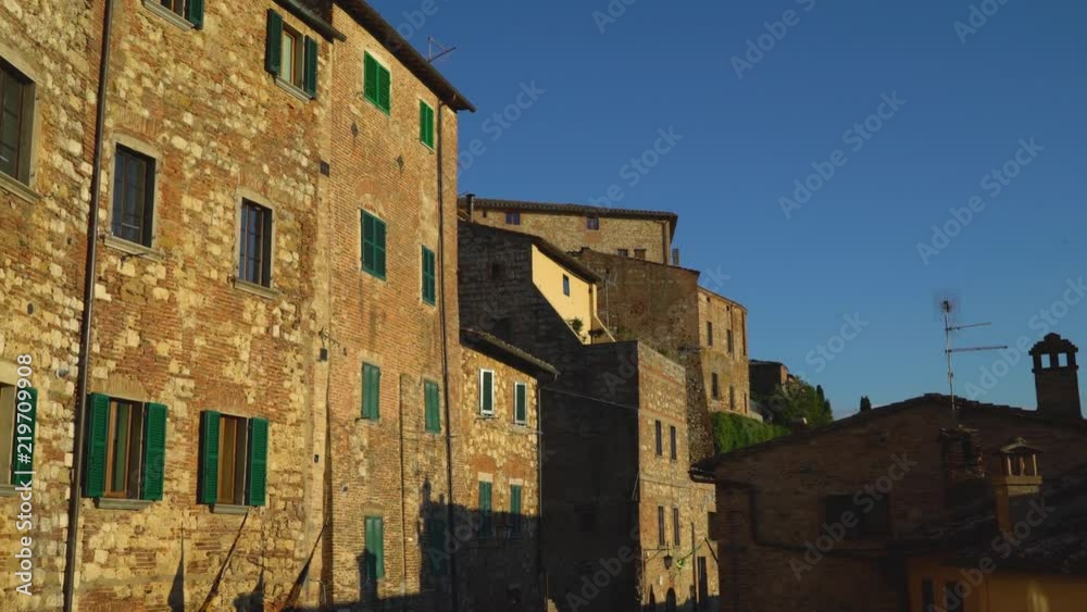 Montepulciano, Siena, Italy - 19 June 2018. Panoramic view of the city at sunset Montepulciano, Siena, Italy - 19 June 2018. Panoramic view of the city at sunset