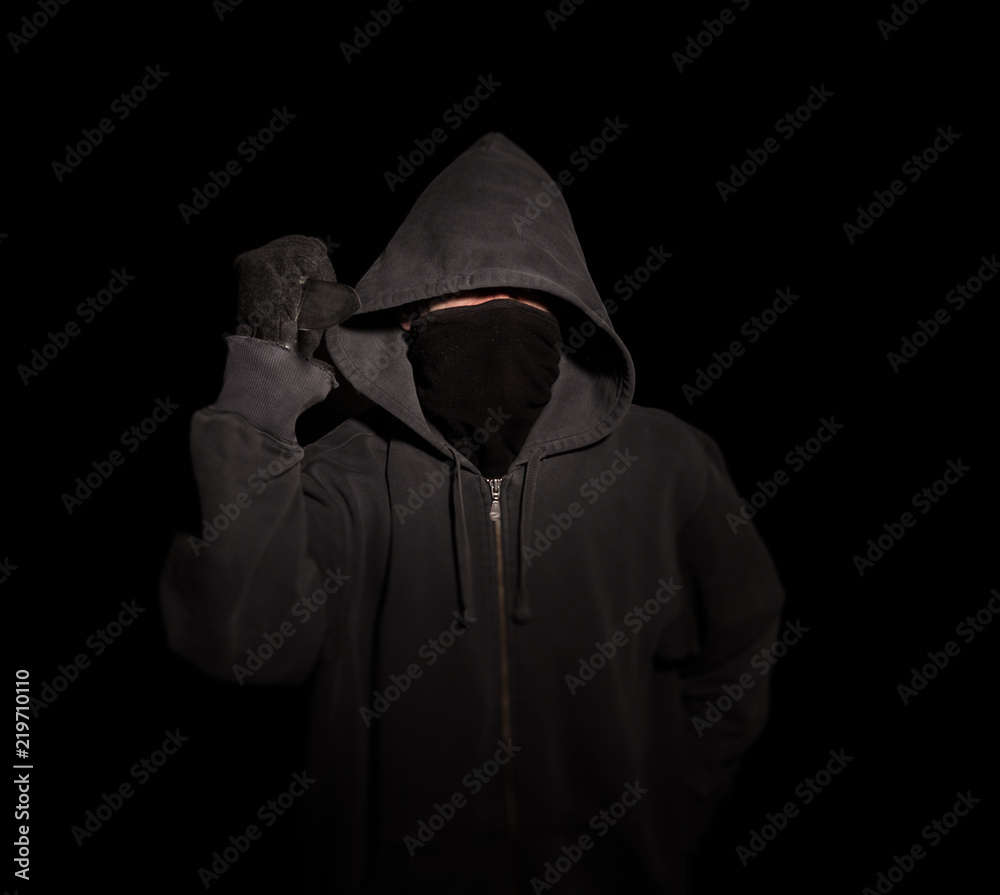 Thug Robber Assassin Hoodie masked with Knife raised in a stabbing motion Thug Robber Assassin Hoodie masked with Knife raised in a stabbing motion