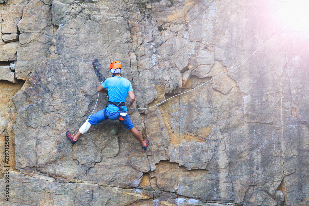 Fototapeta premium secures the climber on a steep cliff insurance