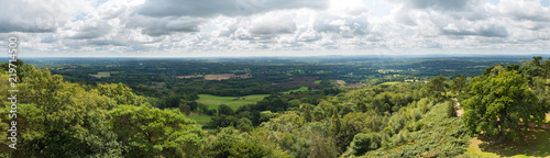 Panoramic view of the Surrey and Sussex countryside from the North Downs to the South Downs in England  UK. Taken from the top of Leith Hill Tower on a cloudy summer s day.