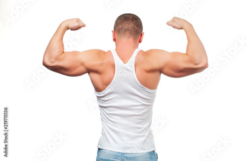 Muscular man showing his great back muscles