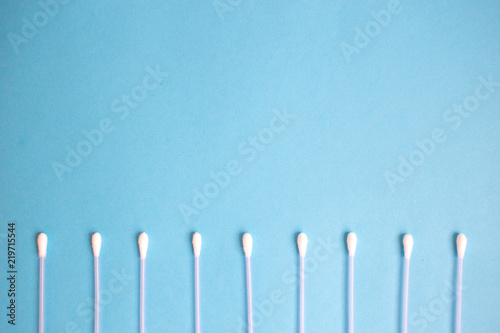 the pattern of the cotton buds on a blue background