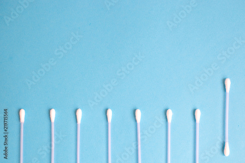 the pattern of the cotton buds on a blue background