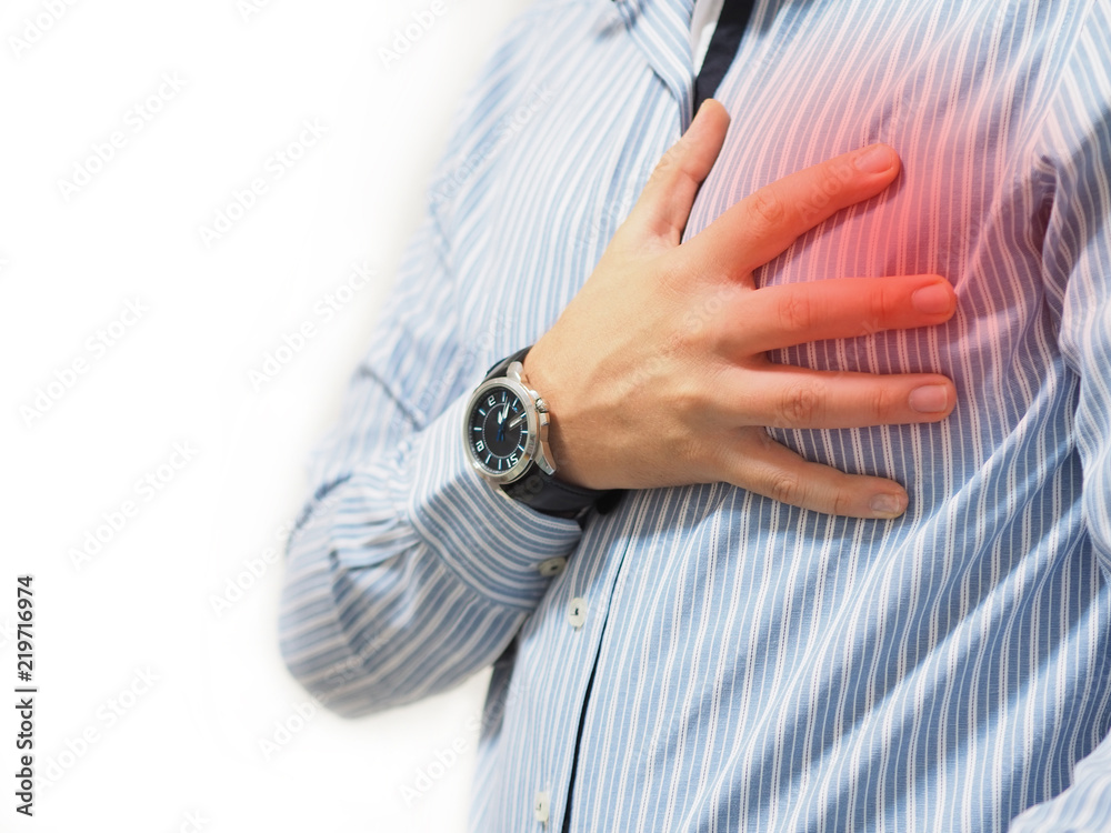 man holding his heart with his hand