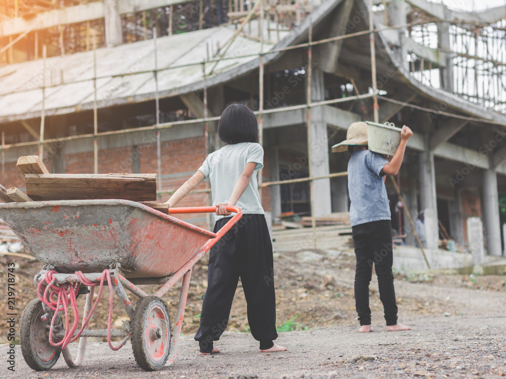 Children working at construction site for world day against child labour concept: Children working at construction site for world day against child labour concept: