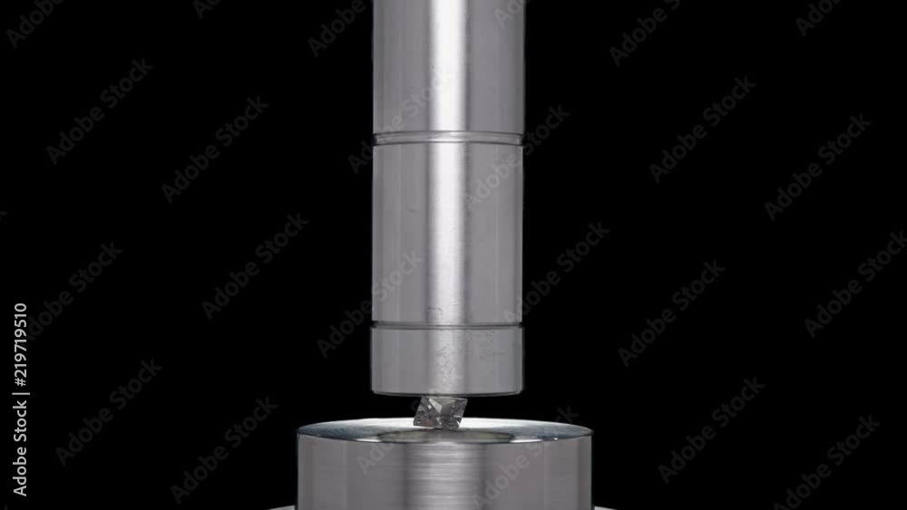 a hardness test of jewelry similar to a diamond, under a hydraulic press a hardness test of jewelry similar to a diamond, under a hydraulic press