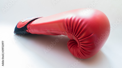 red Boxing Glove close up on white background © boyhey