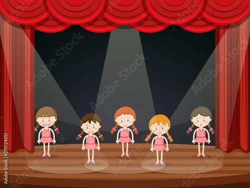 Girls perform ballet on stage