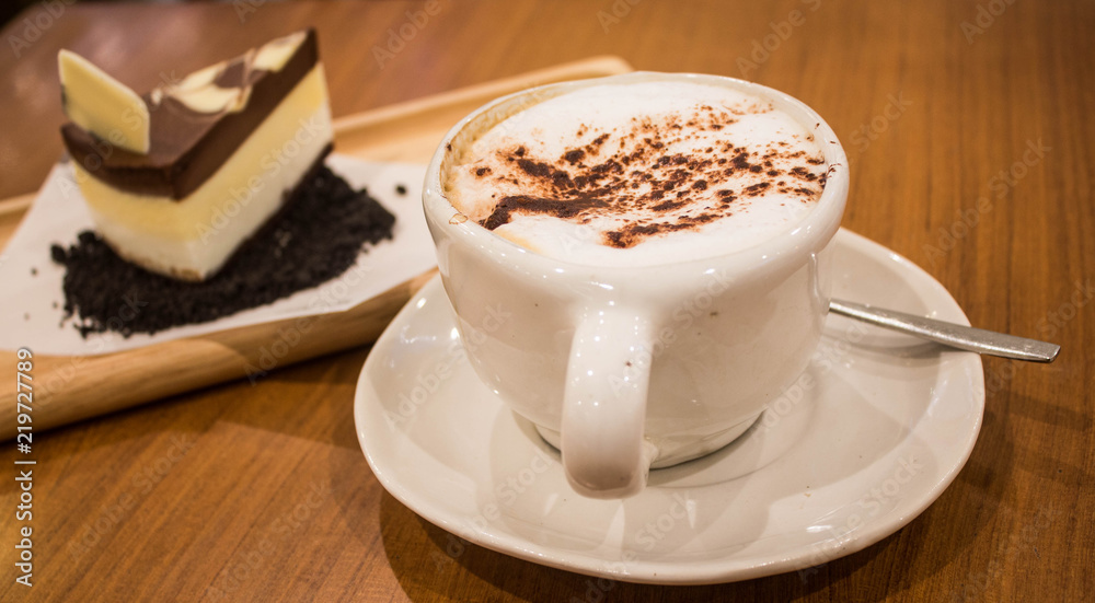 hot cappuccino with chocolate cake background hot cappuccino with chocolate cake background