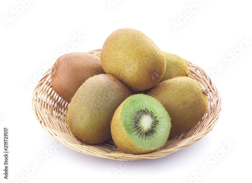 kiwi fruit in basket isolated on white background