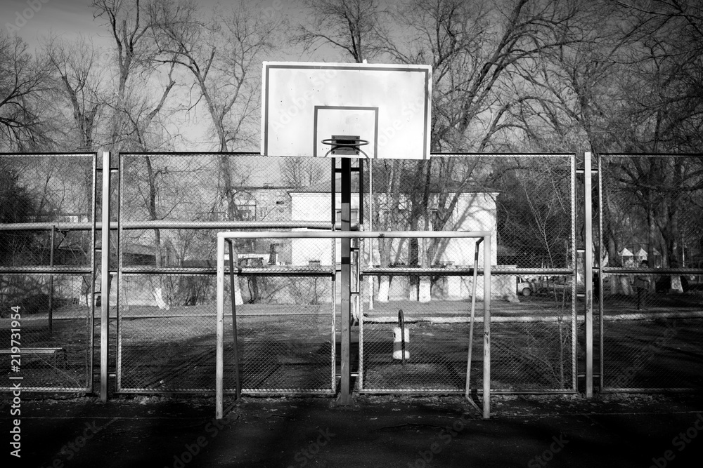 abandoned basketball and football field