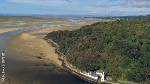 Wallpaper Mural Aerial view, pan move. Drone panorama of lighthouse on cape in Portmeirion, Snowdonia mountains in Wales Torontodigital.ca