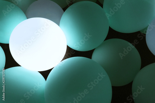 illuminated blue balloon background