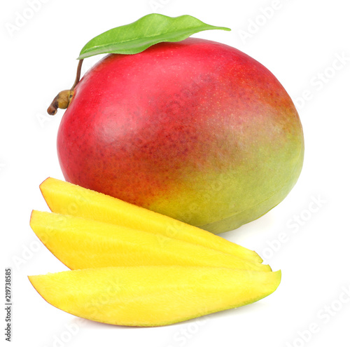 mango slice with green leaves isolated on white background. healthy food.