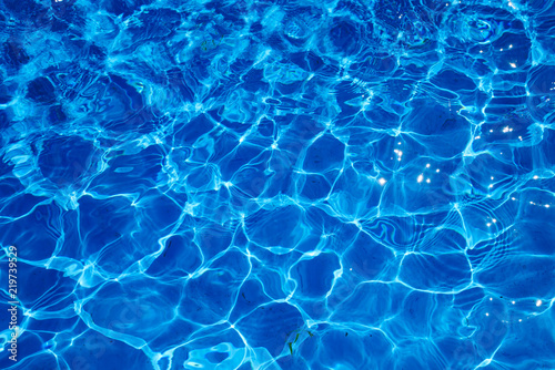 Blue ripped water in swimming pool © EwaStudio