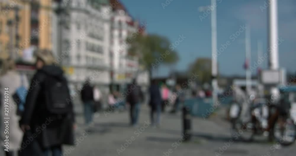 Blurred people walking in the harbour in Stockholm Blurred people walking in the harbour in Stockholm