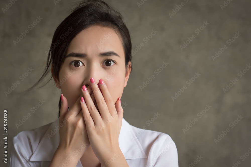 Despair And Fear Concept - Shocked Young Woman Pretending Killing