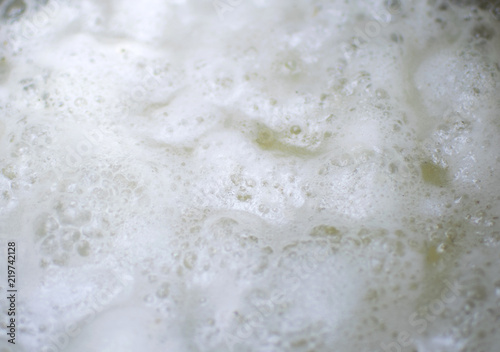 A background of foam on top of the water. © Konstiantyn Zapylaie