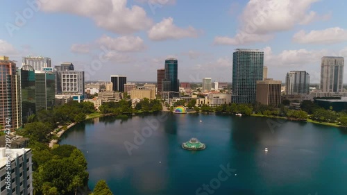 Orlando Florida Lake Eola Down Town Helicopter Drone Sun Set Fountain buildings Amway Center SunTrust